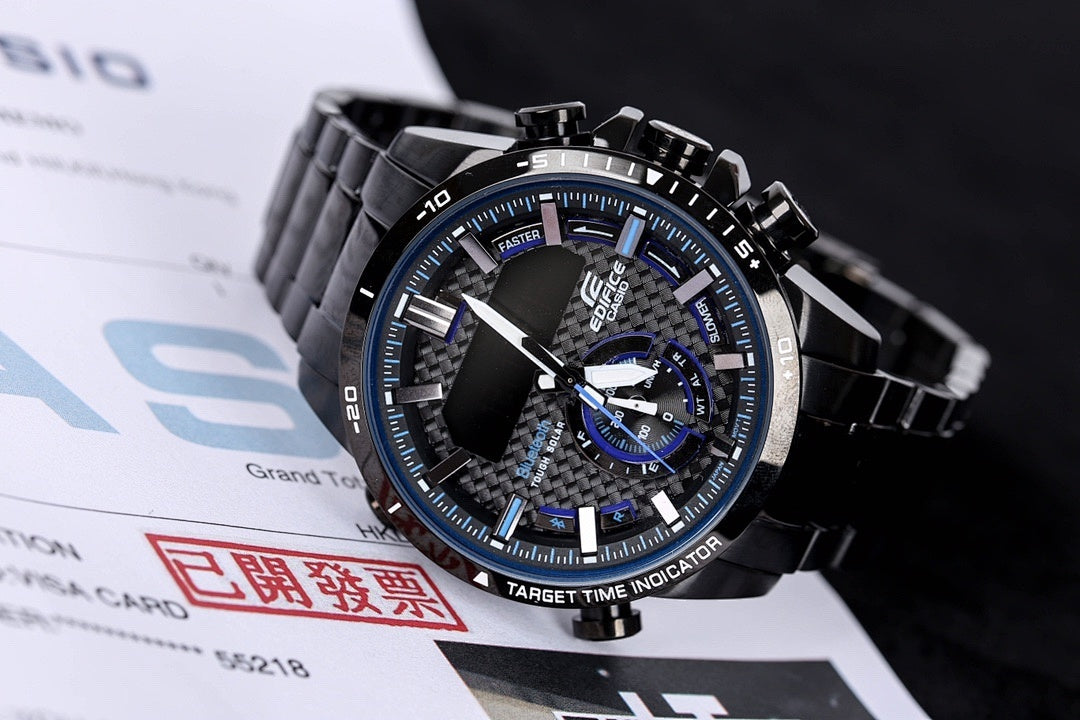 Casio G-Shock watch with black bracelet and blue dial, angled view