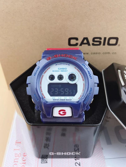 Casio G-Shock watch with blue resin case and digital display, in box