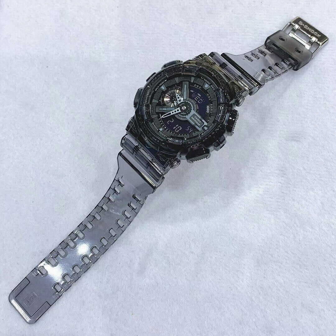 Casio G-Shock watch with black dial and silver-toned bezel, resin strap