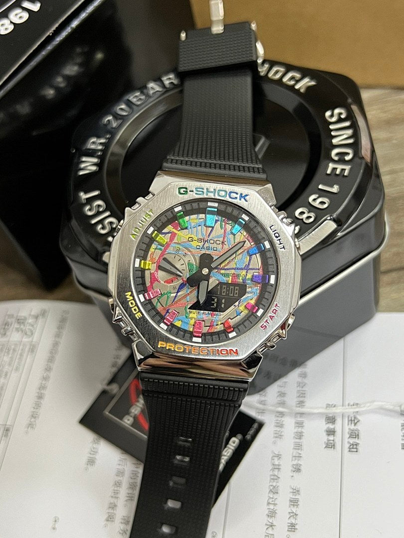 Casio G-Shock wristwatch with colorful digital dial and black silicone strap, metal buckle