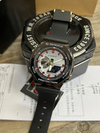 Casio G-Shock wristwatch with black case, red accents, and black silicone strap