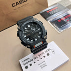Casio G-Shock wristwatch front view with black dial, black resin bezel, and orange trim
