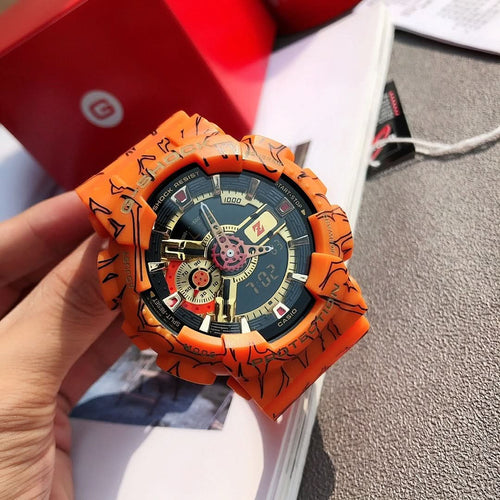 Orange Casio watch with round multi-dial face and graffiti-pattern resin strap
