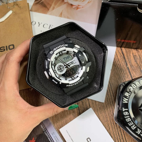 Casio G-Shock digital wristwatch in a black display case, rugged black bezel and dial