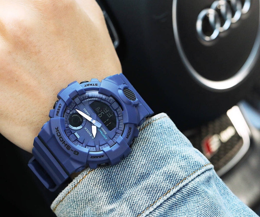 Casio G-Shock blue resin watch with round digital display and chunky strap