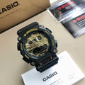 Casio G-Shock watch with black resin strap and gold-tone skeleton dial