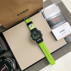 Casio G-Shock watch with lime green strap and black case, metal buckle