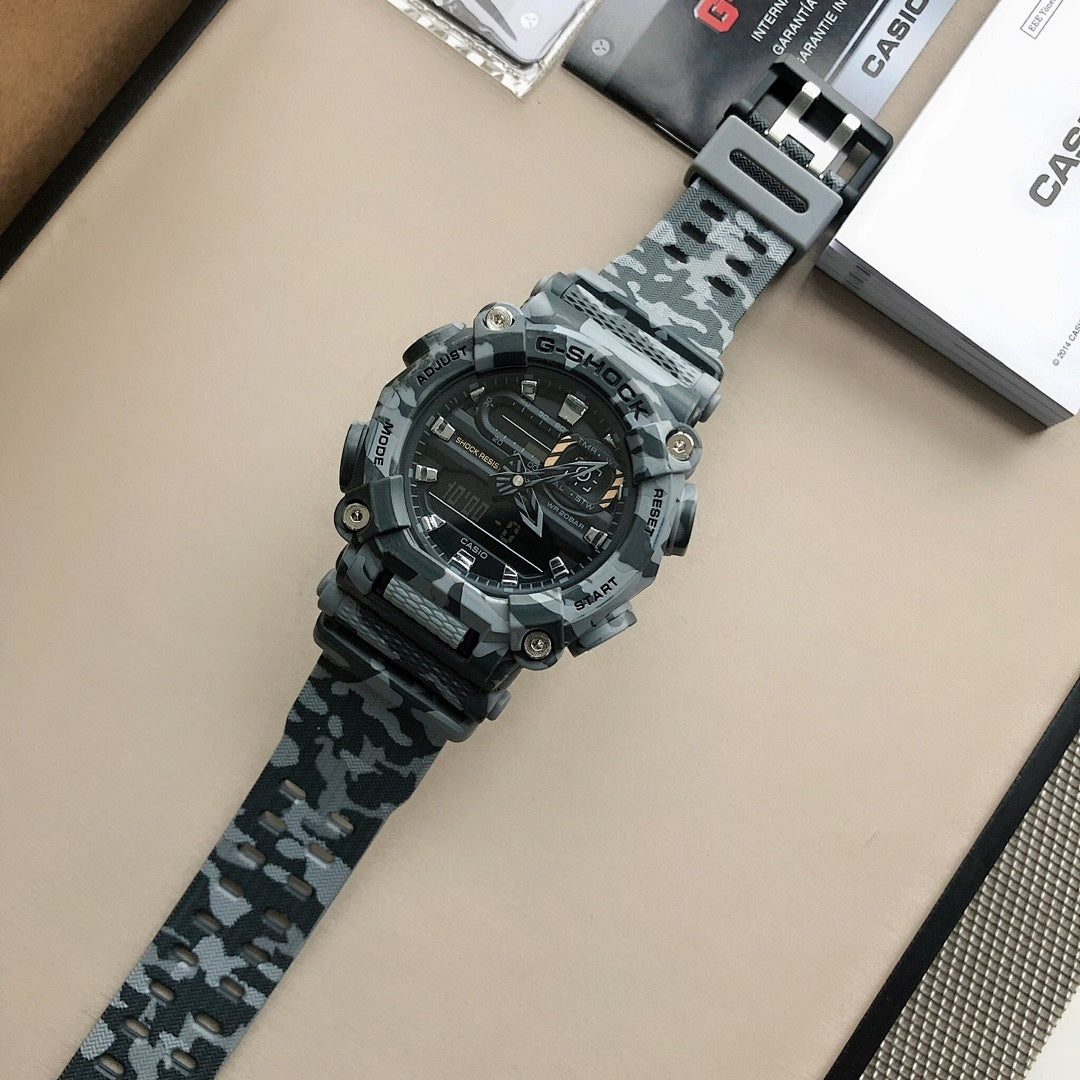 Casio G-Shock watch with camo strap and black dial from angled top view