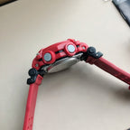 Red G-Shock watch with silver crown and black pushers on raised case
