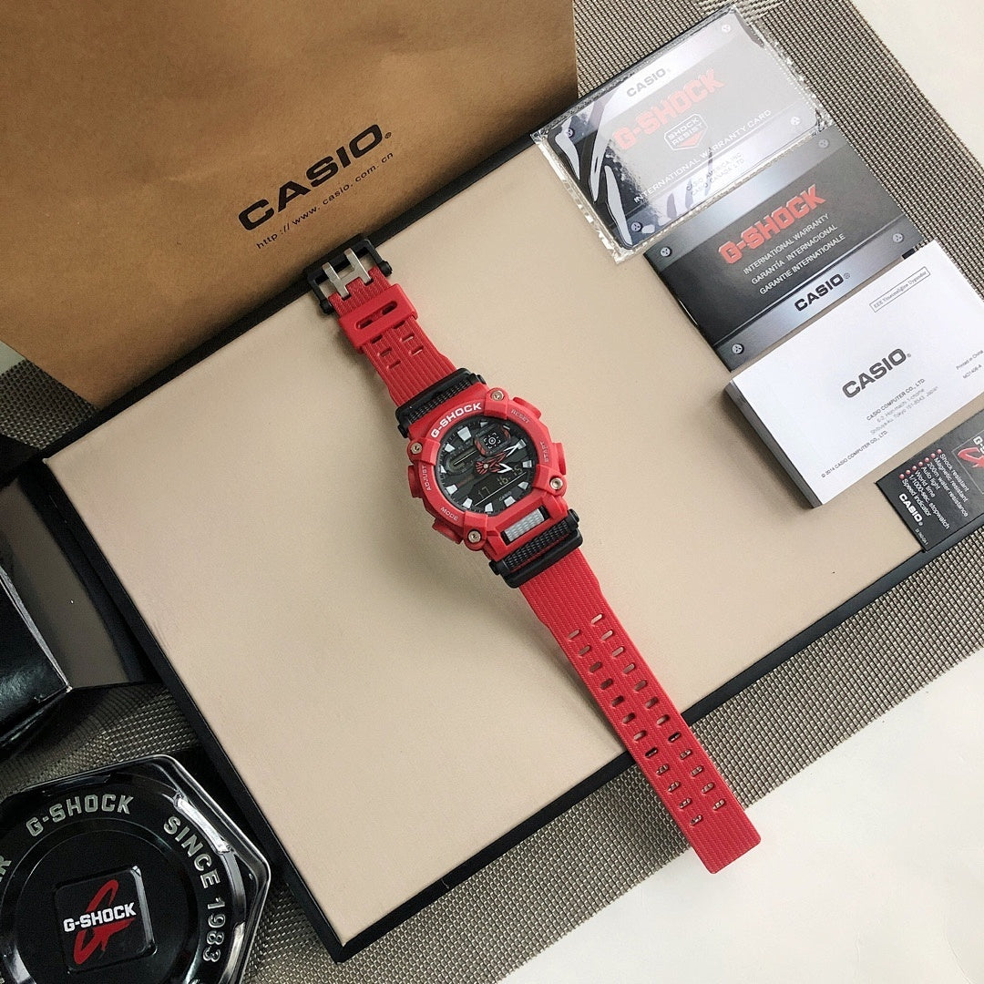 Red G-Shock watch with red perforated strap and black dial housing