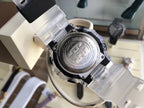 G-Shock watch back case with engraved markings and clear transparent strap