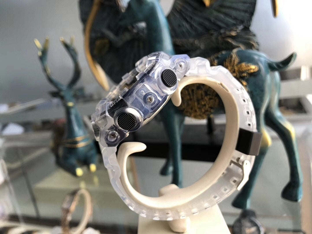 G-Shock watch side view with clear strap and textured buttons