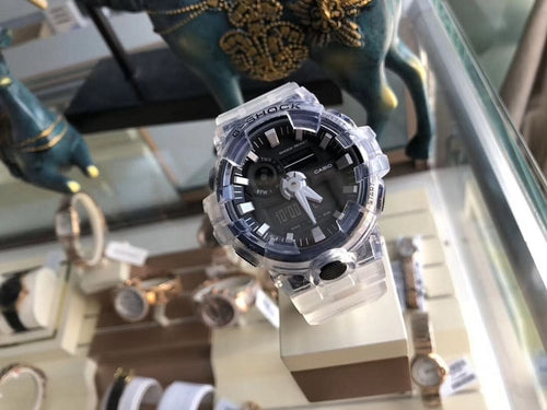 G-Shock watch front view with black dial, clear bezel and transparent strap