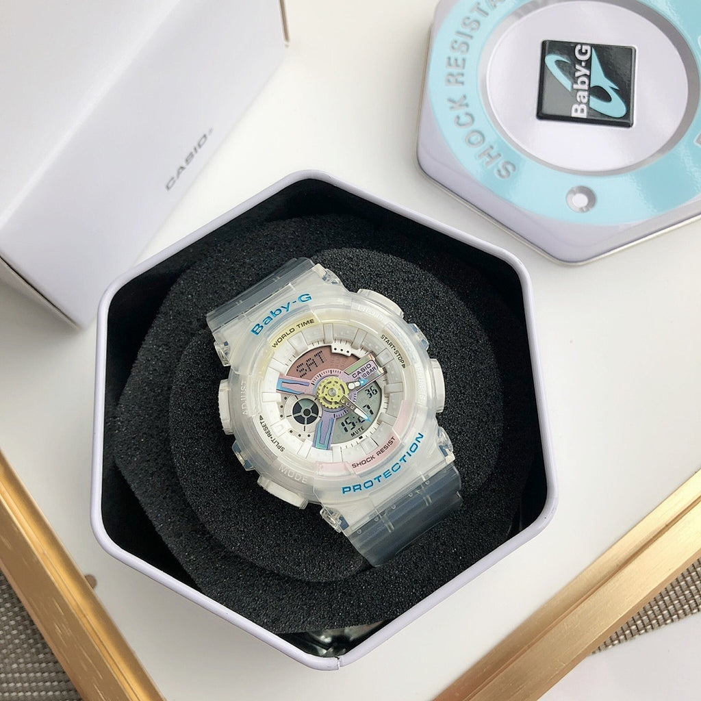 Baby-G translucent white watch resting in foam insert, round multi-dial face