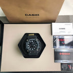 Casio G-Shock wristwatch in box with round black dial and black resin strap