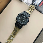 Casio G-Shock wristwatch with camouflage khaki strap and round dark dial
