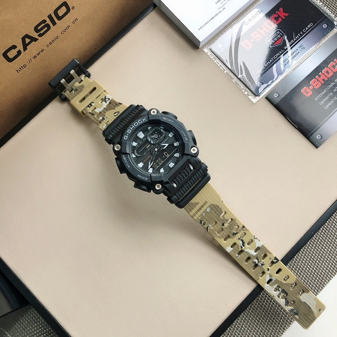 Casio G-Shock wristwatch with camouflage khaki strap and dark round face