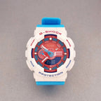 G-Shock wristwatch with white resin case, red bezel, and blue strap
