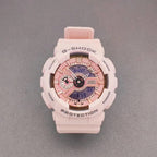 G-Shock wristwatch with white resin case, rose dial details, and light pink strap
