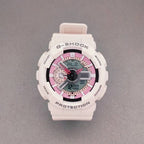 G-Shock wristwatch with white resin case, pink dial accents, and light pink strap