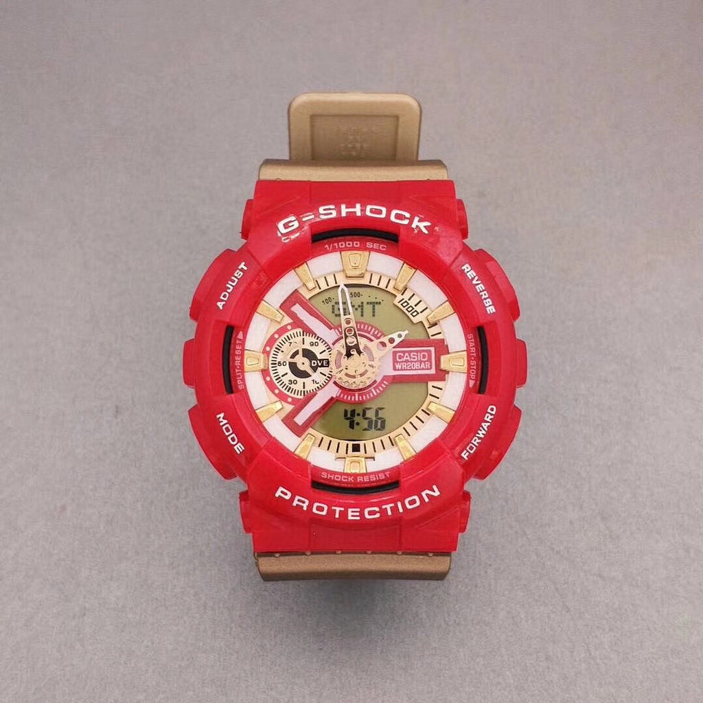 G-Shock wristwatch with red resin case, gold-toned dial, and tan strap