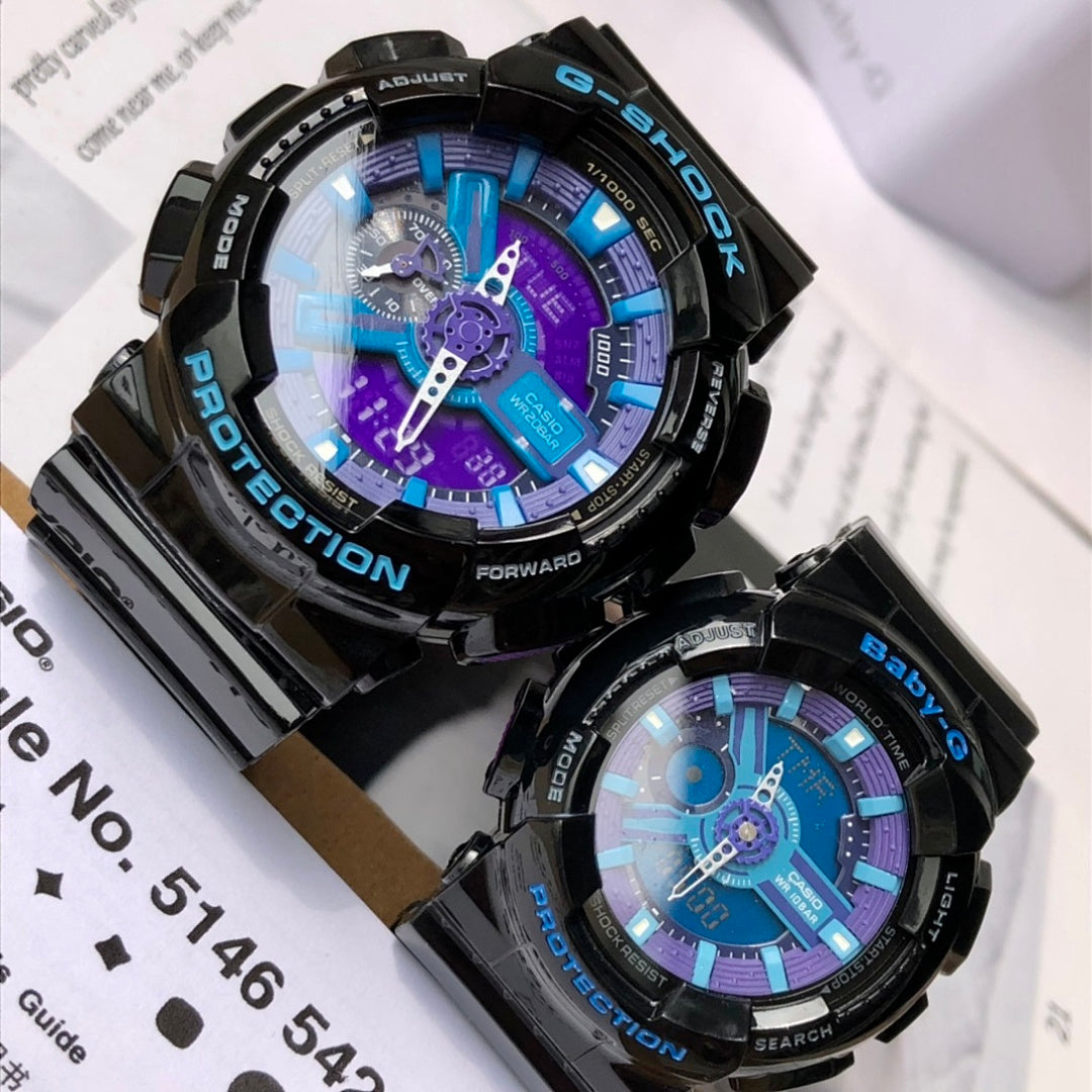 Black Casio G-Shock watch with blue and purple digital dial on a black resin strap