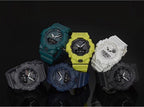 Set of Casio watches with teal, yellow, white, and dark straps and round digital faces