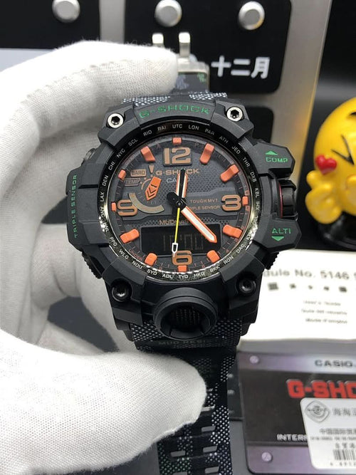 Casio rugged sports watch with black case and orange-accent dial