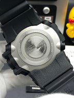 Casio watch caseback on black textured strap with brushed metal back plate