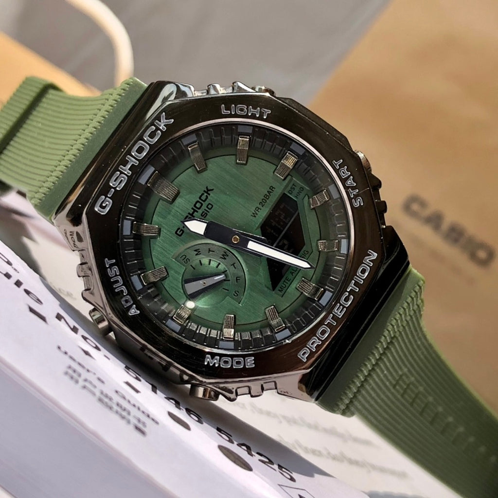 Casio G-Shock wristwatch front, green resin strap, black bezel, green dial with hands
