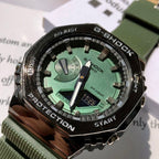 Casio G-Shock wristwatch close-up, green dial, black bezel, rugged case and buttons