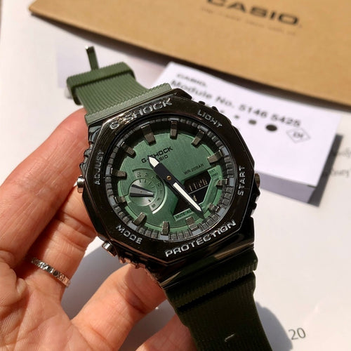 Casio G-Shock wristwatch, green resin strap, black bezel, green dial with subdials