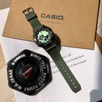 Casio G-Shock wristwatch, green resin strap, black case, green dial with mode detailing