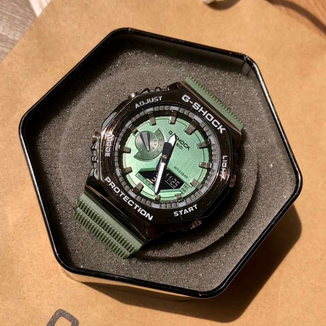 Casio G-Shock wristwatch, green dial, black bezel, green resin strap in display tray