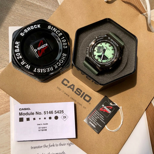 Casio G-Shock wristwatch, green resin strap, black case, green dial with bold markings