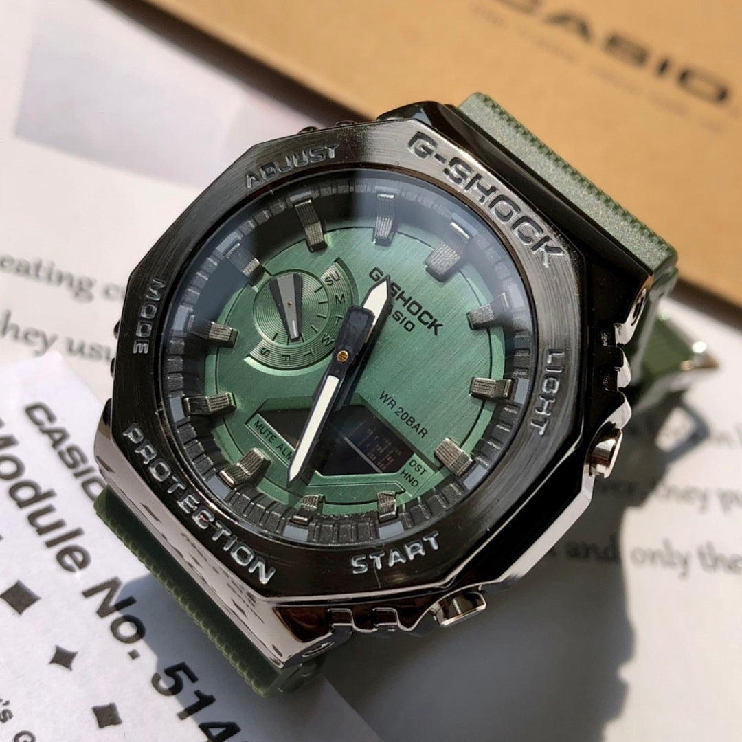 Casio G-Shock wristwatch close-up, green dial, black bezel, green resin strap