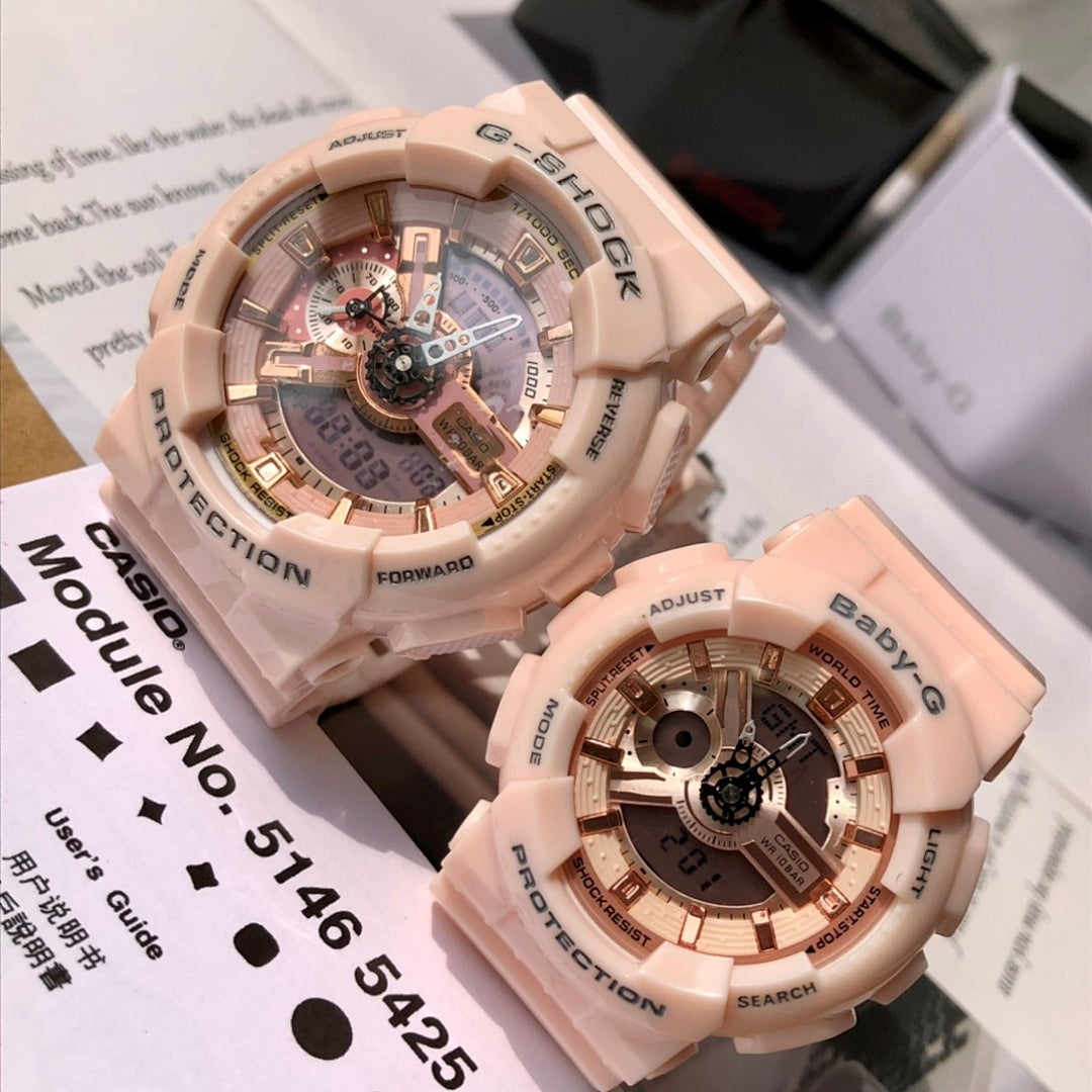 Pair of light pink resin wristwatches with round skeleton dials and digital markers