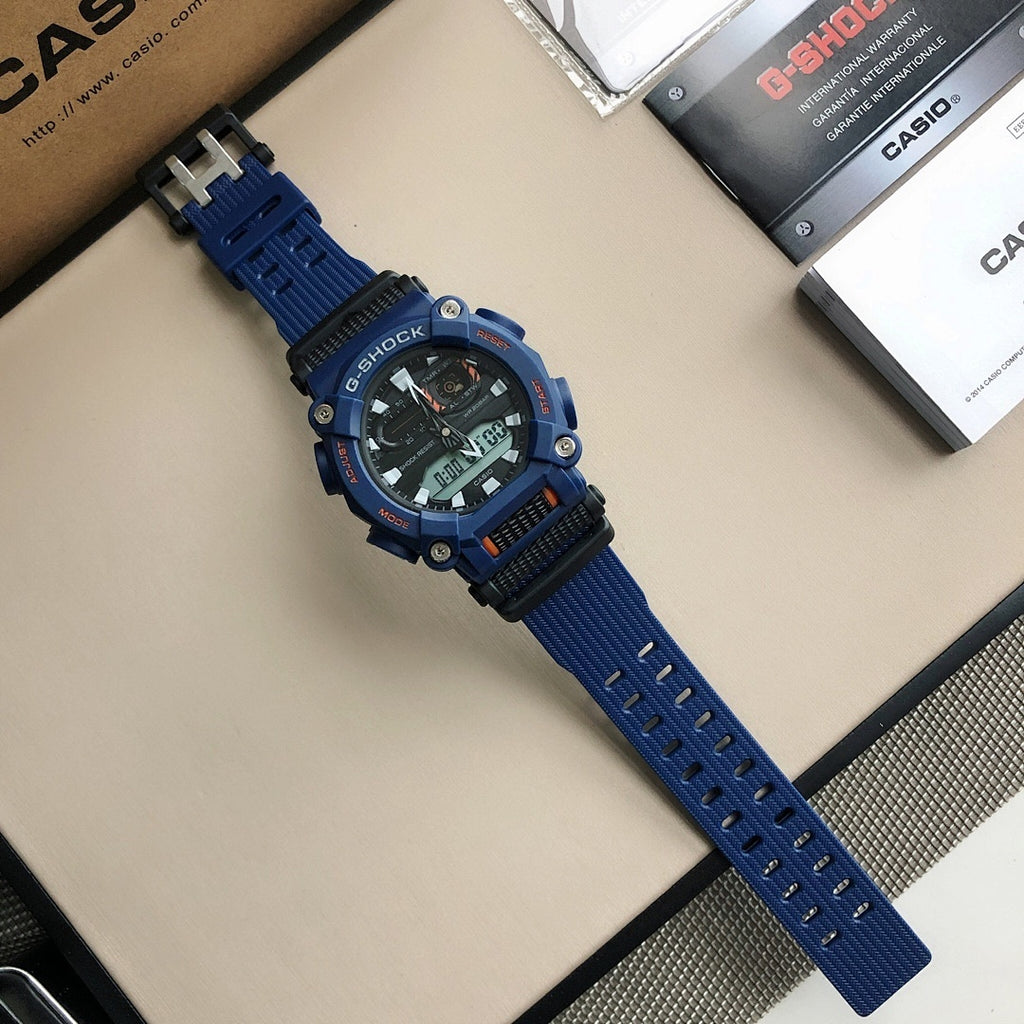 Casio G-Shock watch with blue strap and black dial, silver clasp hardware