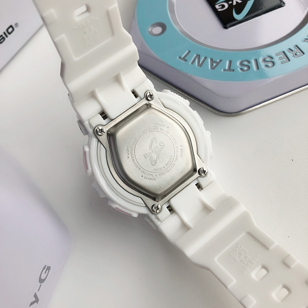 Casio resin watch case with metal clasp and engraved case back on white band