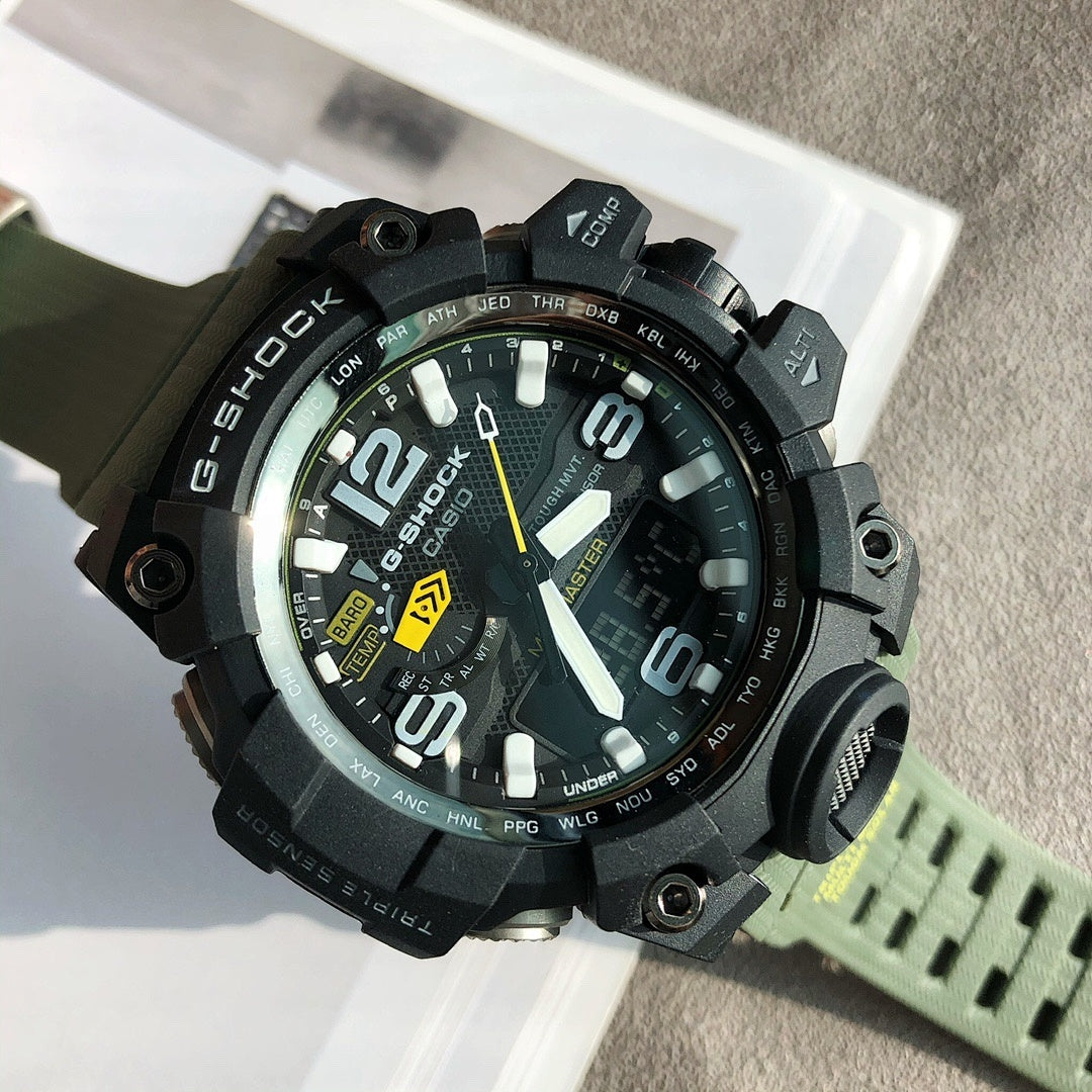 G-Shock style digital watch with black case, lime dial graphics, olive rubber strap