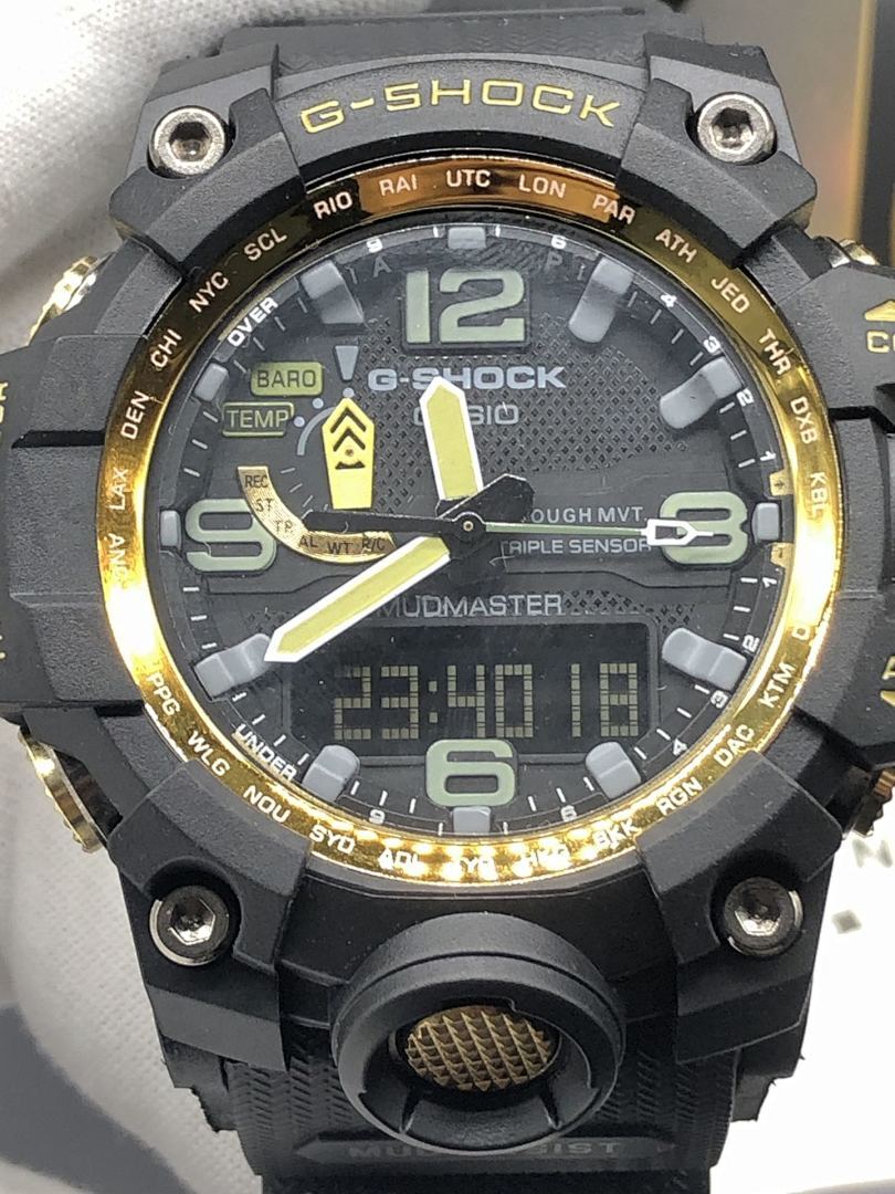 Casio G-Shock wristwatch face close-up with large digital numerals and green bars