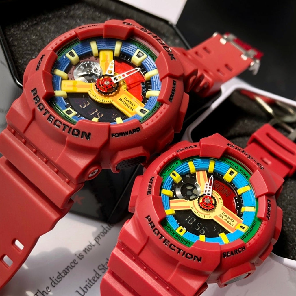 Two red Casio watches side by side with colorful multi-panel dials
