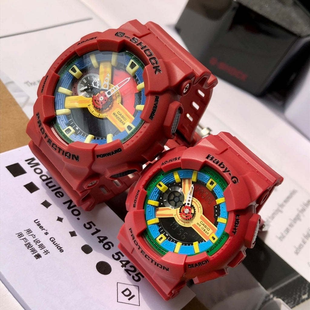 Red Casio watch pair displaying round colorful dials and red perforated straps