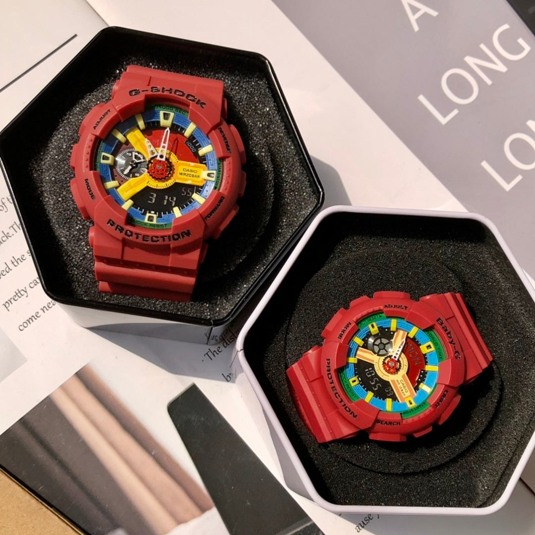 Two red Casio watches in black display boxes with colorful dial faces