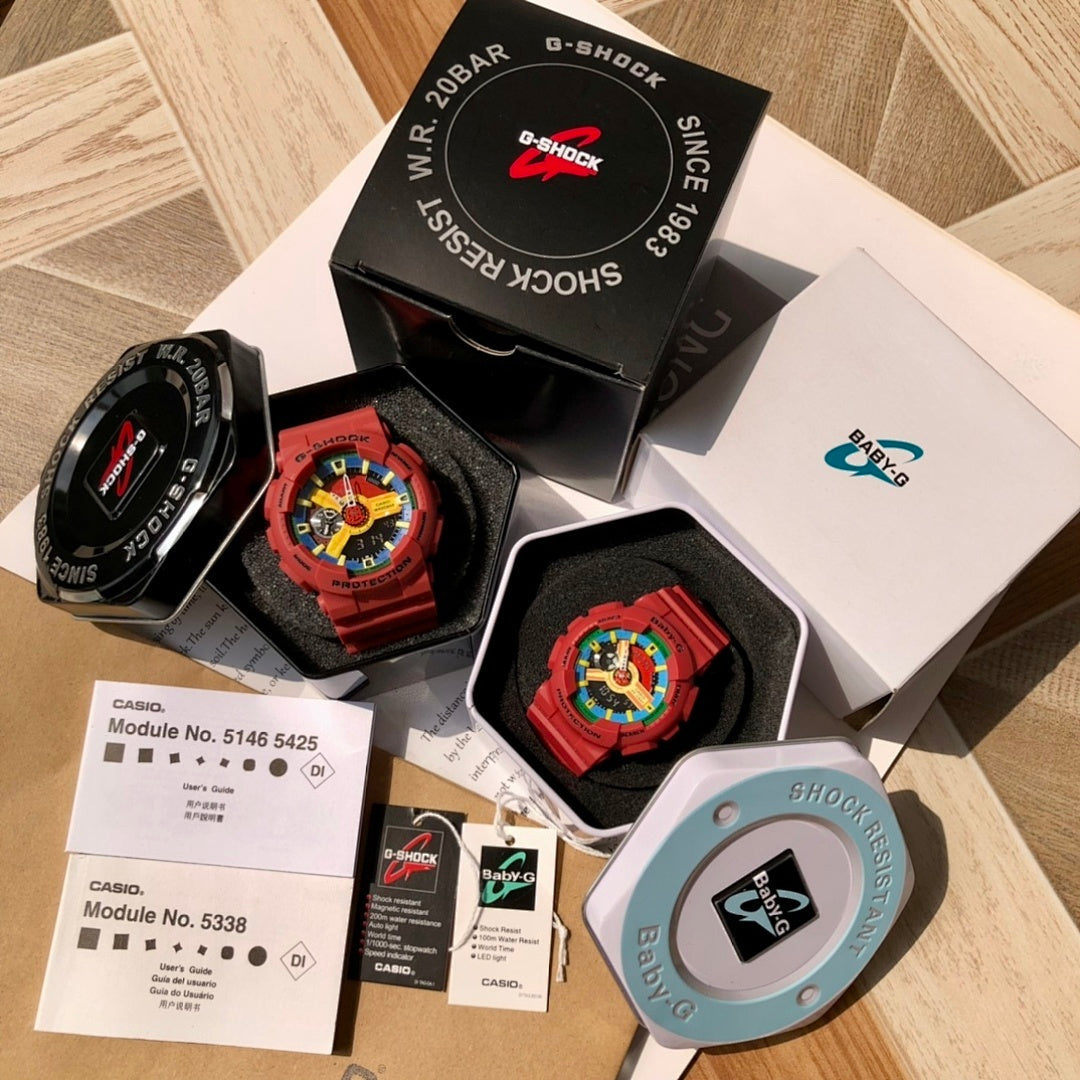 Casio watch set with two red watches, black and white boxes, and colorful dials
