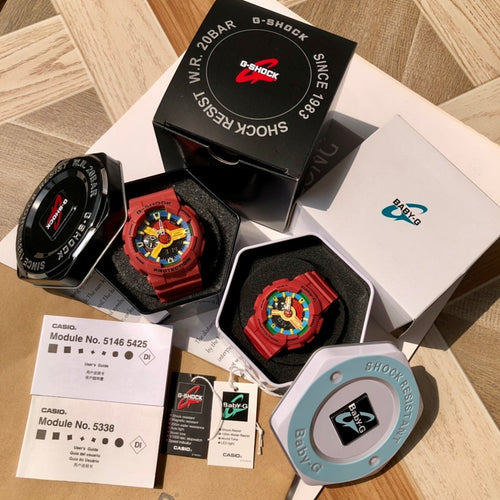 Casio watch set with two red watches, black and white boxes, and colorful dials