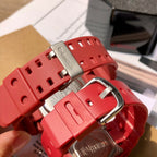 Red Casio watch with metal buckle clasp and perforated resin strap