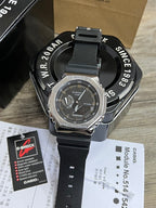Casio G-Shock watch with black resin strap and gunmetal dial