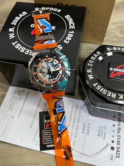 Casio G-Shock watch with orange and blue resin strap and colorful dial