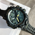 G-Shock digital watch with black case, yellow hand accents, and dark green dial